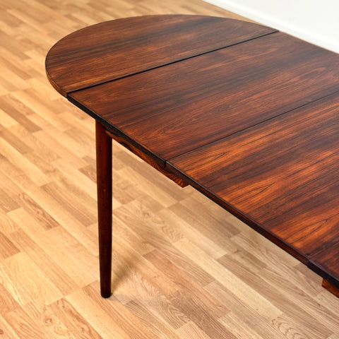 Danish dining table in Santos rosewood in the style of Arne Vodder