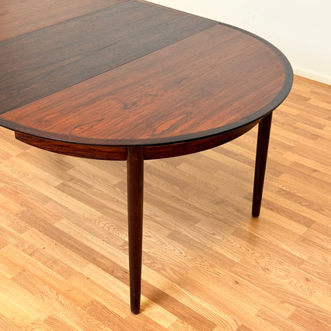 Danish round dining table in Santos rosewood