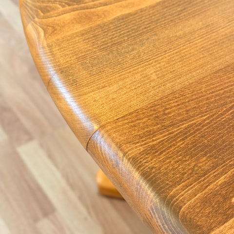 Danish round dining table in elm