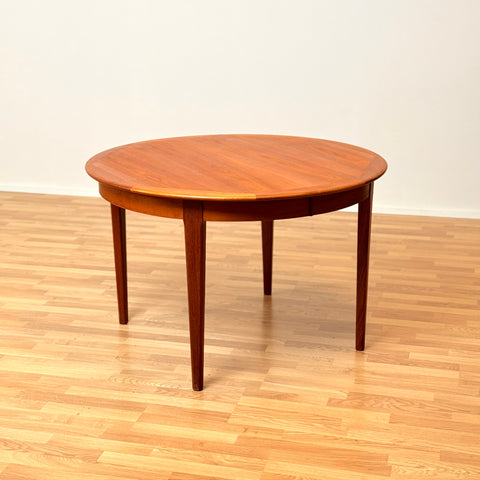 Large danish round dining table in teak