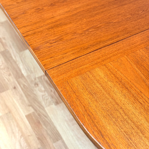 Swedish oval dining table in teak