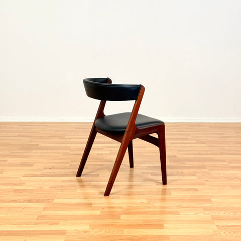Danish dining chairs in walnut by Kai Kristiansen