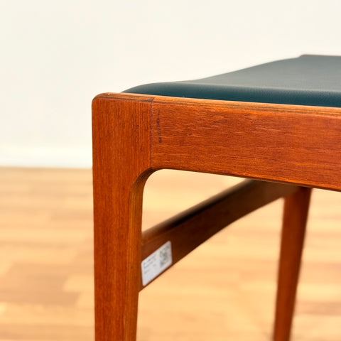 Danish dining chairs in teak by Erik Buch
