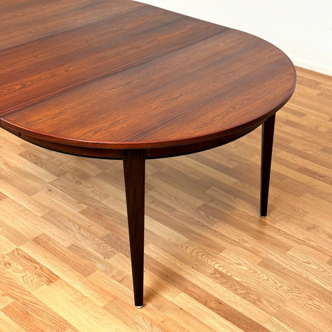 Danish round dining table in Santos rosewood by Omann Jun, model 55