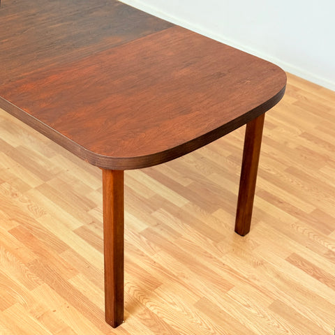 Swedish oval dining table in walnut