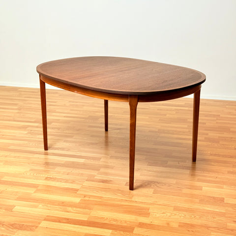 Swedish oval dining table in walnut by Albin Johansson & Söner