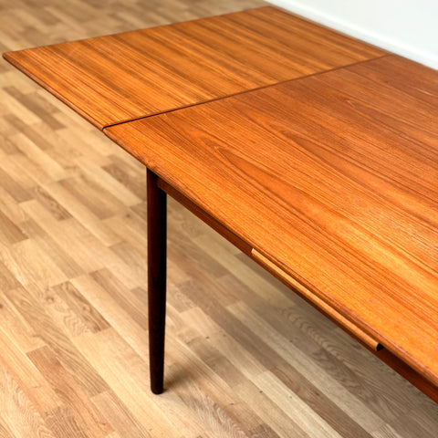 Danish dining table in teak with 2 extension boards