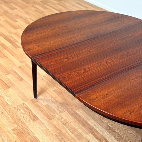 Danish round dining table in Santos rosewood by Omann Jun, model 55