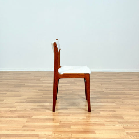 Danish dining chairs in teak by Erik Buch