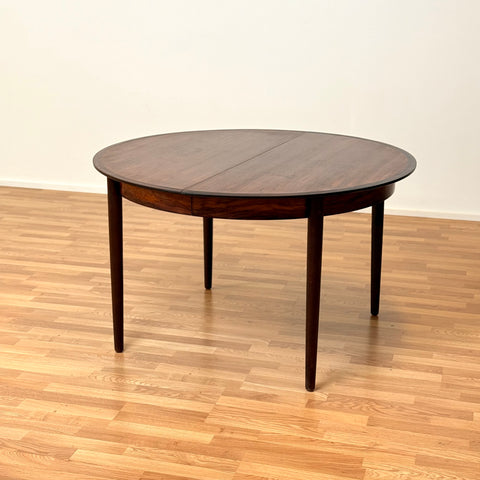 Danish round dining table in Santos rosewood