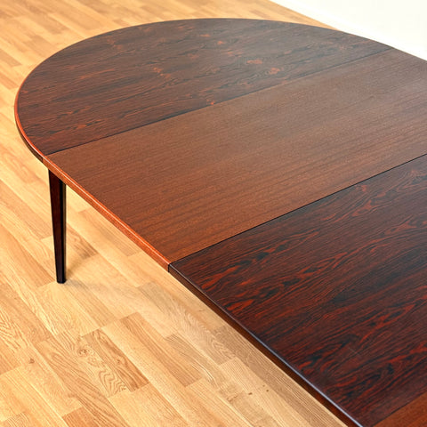 Danish round dining table in Santos rosewood by Oman Junn