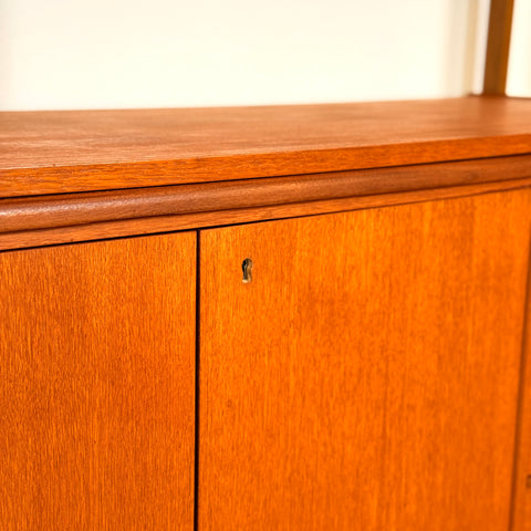 Swedish bookshelf with pull out desk in teak wood