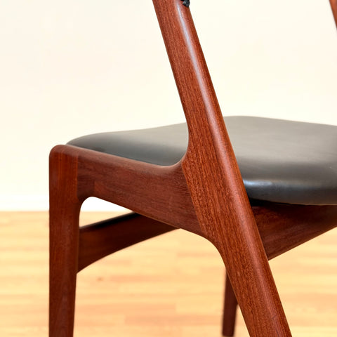 Danish dining chairs in walnut by Kai Kristiansen