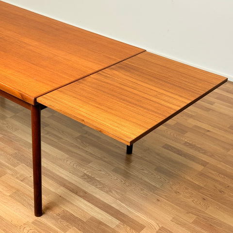 Danish dining table in teak by Henning Kjærnulf for Vejle furniture factory