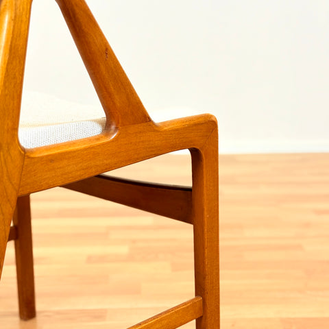 Danish single dining chair in teak by Henning Kjærnulf