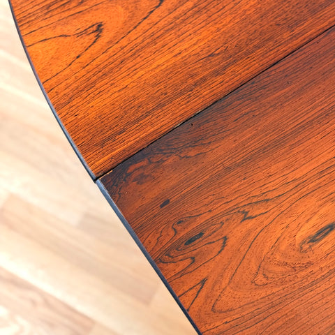 Danish round dining table in Santos rosewood