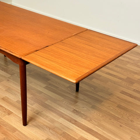 Danish dining table with in teak