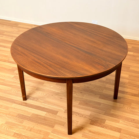 Danish round dining table in teak & beech