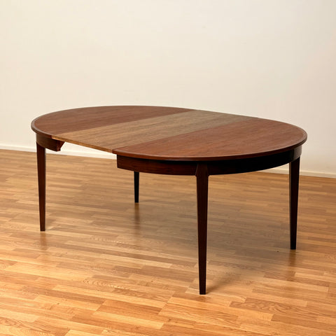 Danish round dining table in Santos rosewood