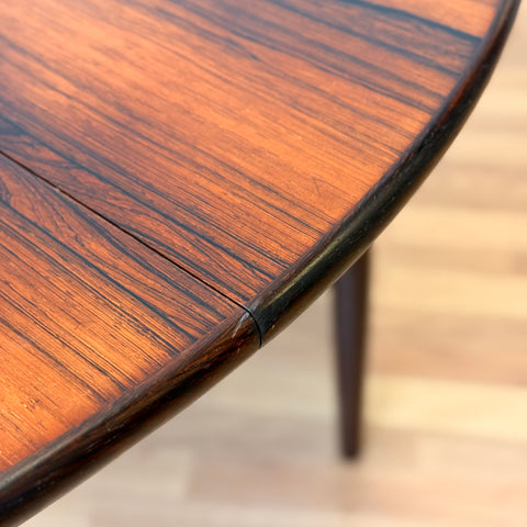 Danish round dining table in Santos rosewood by Elsteds Møbelfabrik