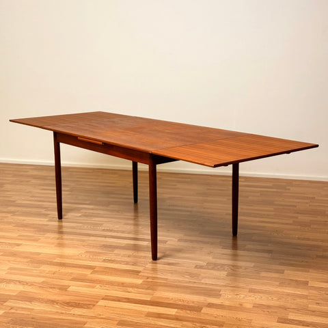 Danish dining table in teak with 2 extension boards