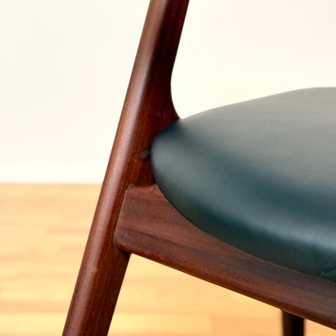 Danish dining chairs in walnut by Kai Kristiansen