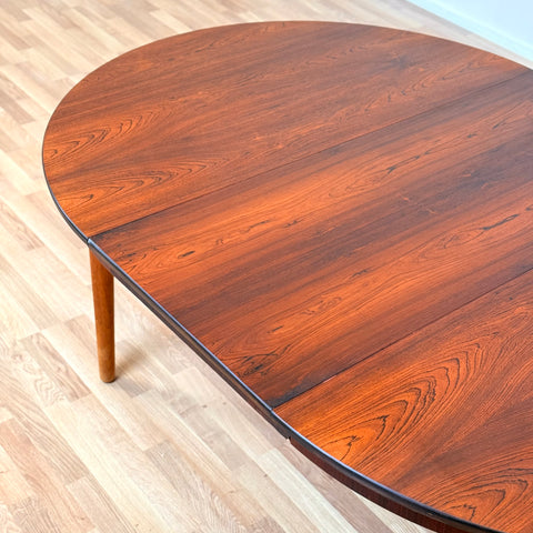Danish round dining table in Santos rosewood