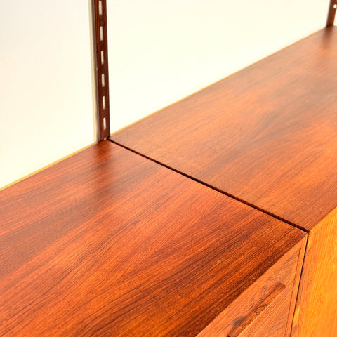 Danish wall unit / shelving system in Santos rosewood by Kai Kristiansen, for FM Mobler