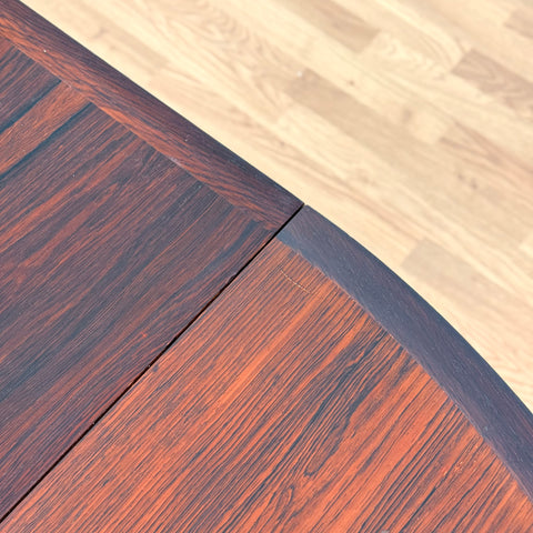 Danish round dining table in Santos rosewood