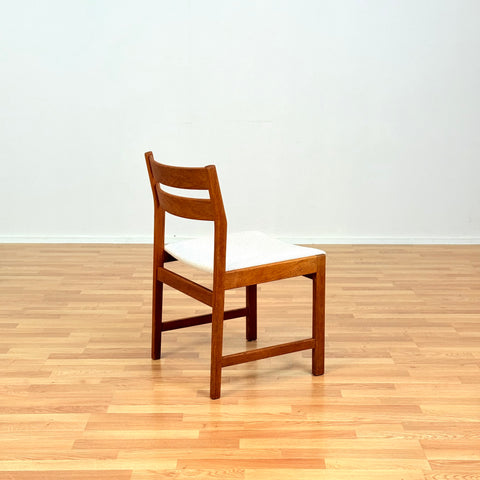 Danish dining chairs in solid oak by Kurt Østervig, for KP Møbler