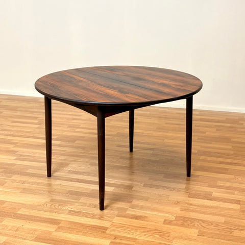 Danish round dining table in Santos rosewood by Elsteds Møbelfabrik
