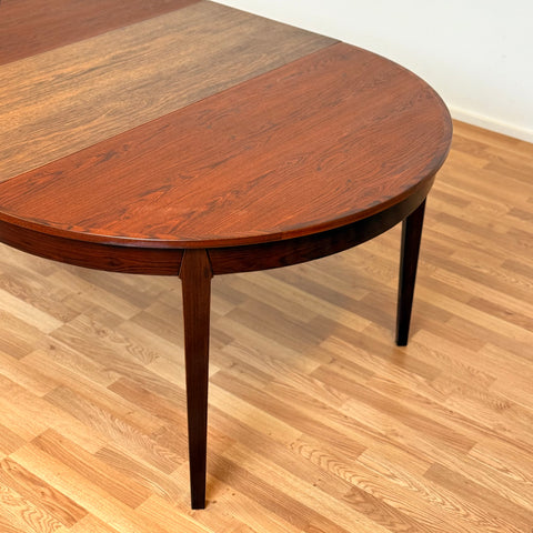 Danish round dining table in Santos rosewood