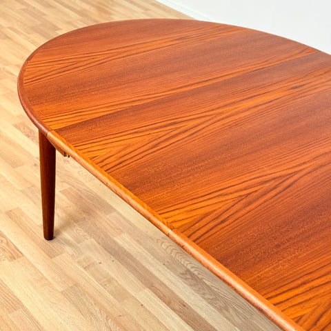 Danish round dining table in teak