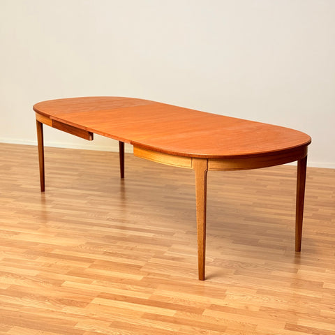 Swedish oval dining table "Herrgården" in mahogany by Carl Malmsten