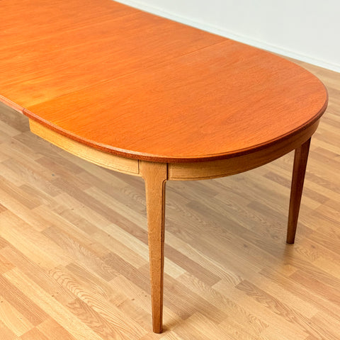 Swedish oval dining table "Herrgården" in mahogany by Carl Malmsten