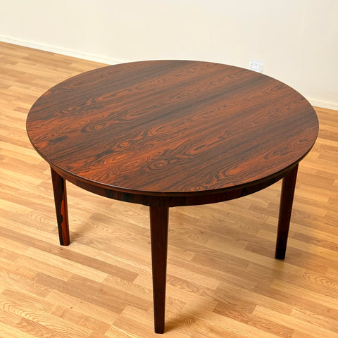 Danish round dining table in Santos rosewood