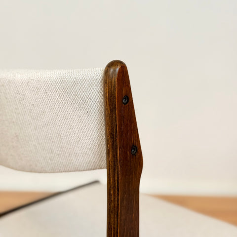 Danish dining chairs in solid stained oak by Erik Buch