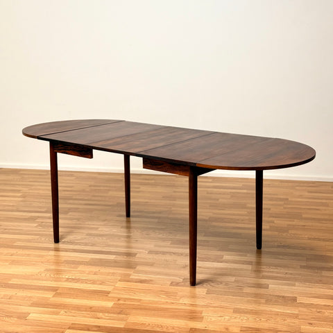 Danish dining table in Santos rosewood in the style of Arne Vodder