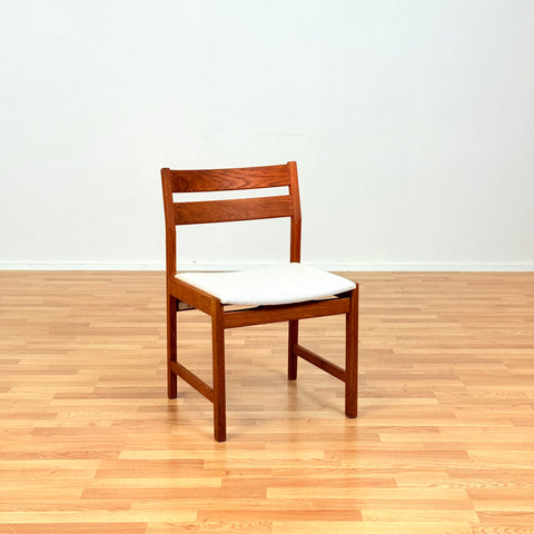 Danish dining chairs in solid oak by Kurt Østervig, for KP Møbler