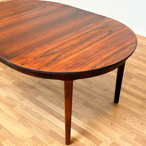 Danish round dining table in Santos rosewood