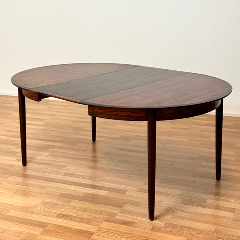 Danish round dining table in Santos rosewood