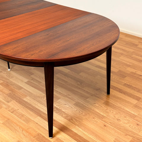 Danish round dining table in Santos rosewood by Omann Jun, model 55