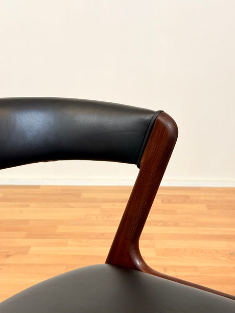 Danish dining chairs in walnut by Kai Kristiansen