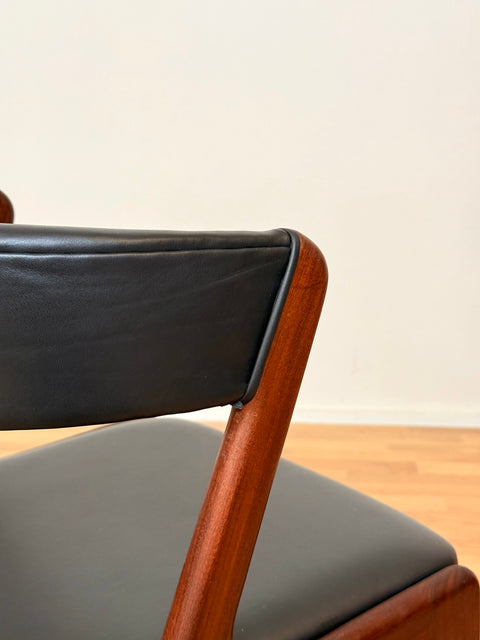 Danish dining chairs in walnut by Kai Kristiansen
