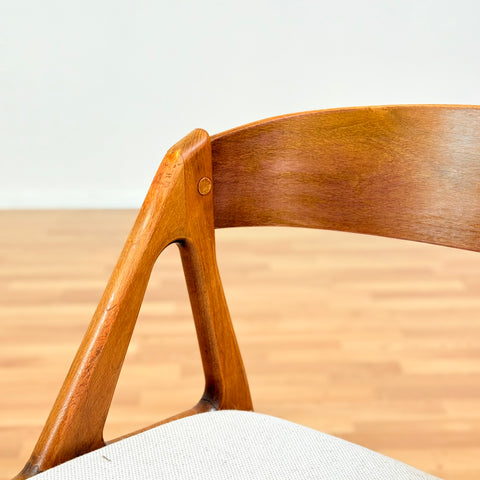 Danish single dining chair in teak by Henning Kjærnulf