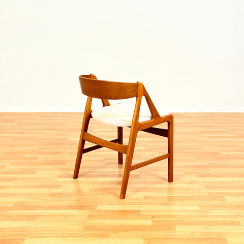 Danish single dining chair in teak by Henning Kjærnulf