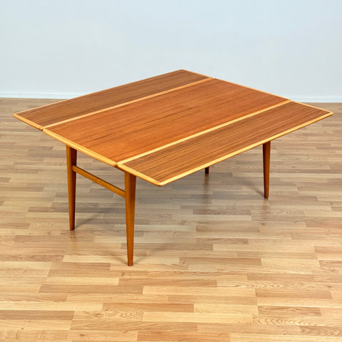 Swedish extandable coffee table in teak & beech