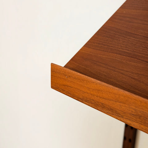 Danish wall unit / shelving system in walnut by Poul Cadovius
