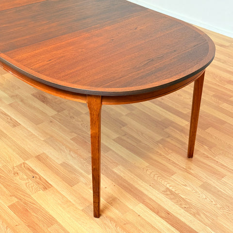 Swedish oval dining table in walnut by Albin Johansson & Söner