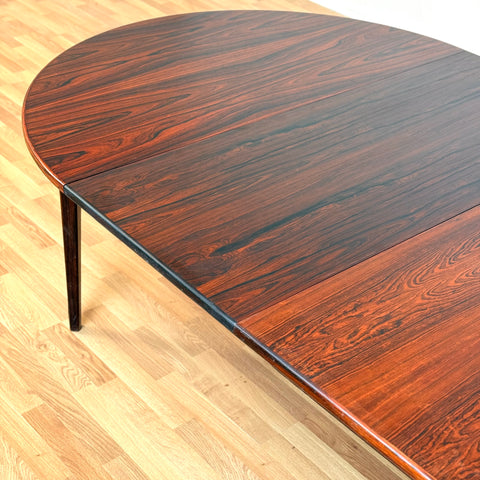 Danish round dining table in Santos rosewood